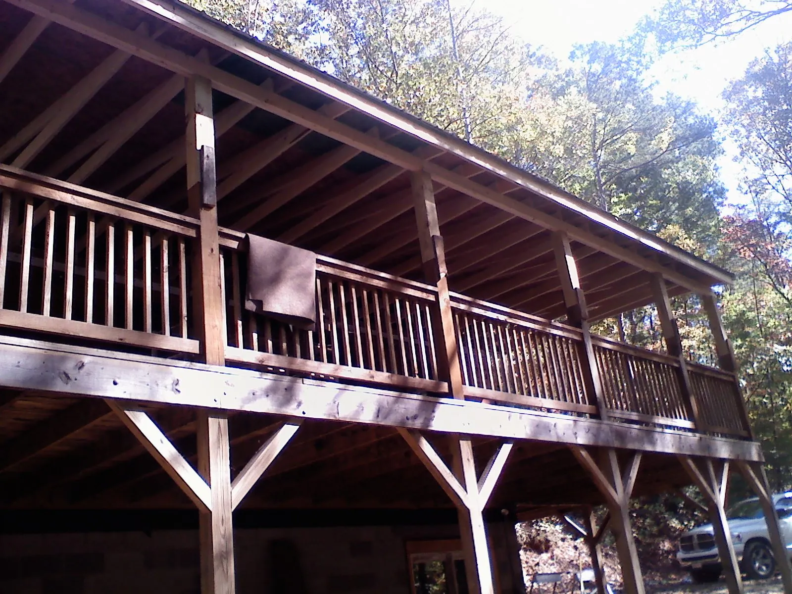 Timber framing under a new elevated porch and deck — Roof Leak Repair in Macomb by Roofing Brothers